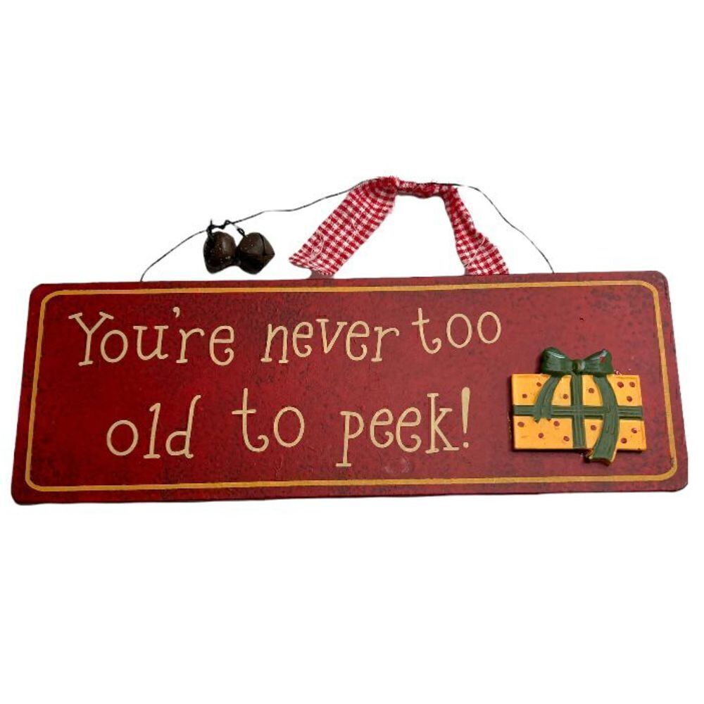 “You’re never too old to peek!” Sign